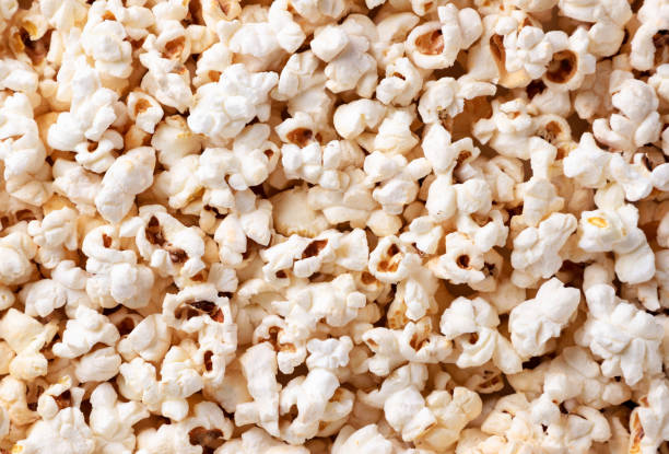 istock Popcorn background, film viewing. The view from top 1317839860