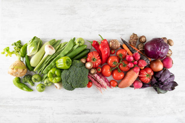istock Fresh Red and Green Vegetable Background 1317842136