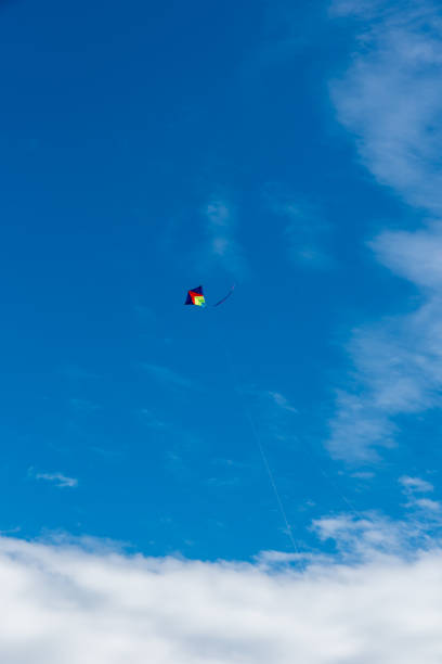 istock Colorful Kites flying over the sky 1317846592