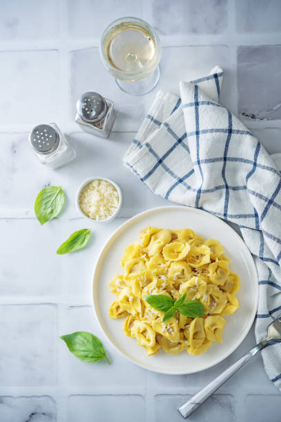 istock Fresh prepared Tortellini pasta with basil in a plate 1317851160