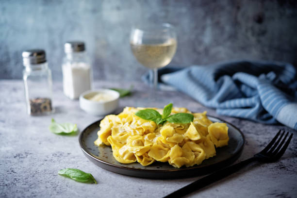 istock Fresh prepared Tortellini pasta with basil in a plate 1317851166