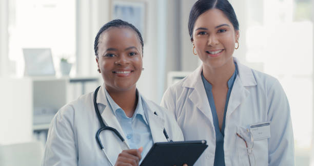 istock Portrait of two doctors using a digital tablet together in a hospital 1317852149