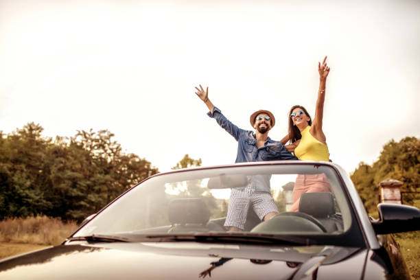 istock Beautiful couple enjoying on a road trip 1317855981