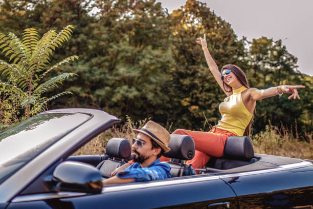 istock Beautiful couple enjoying on a road trip 1317856290