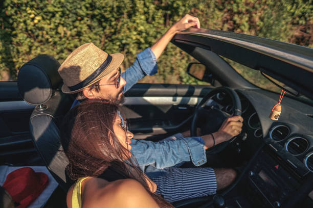 istock Beautiful couple enjoying on a road trip 1317856305