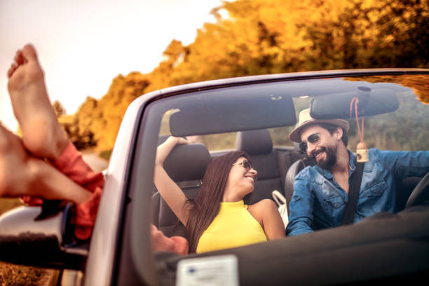 istock Beautiful couple enjoying on a road trip 1317856321