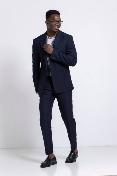 istock Young African American man posing in a photo studio 1317864243