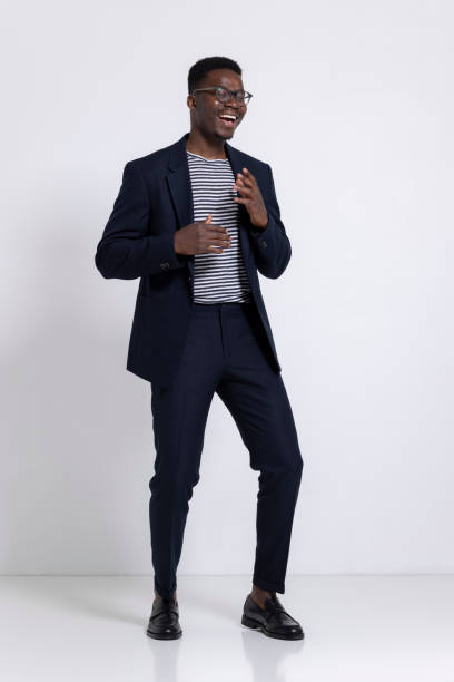 istock Young African American man posing in a photo studio 1317864244