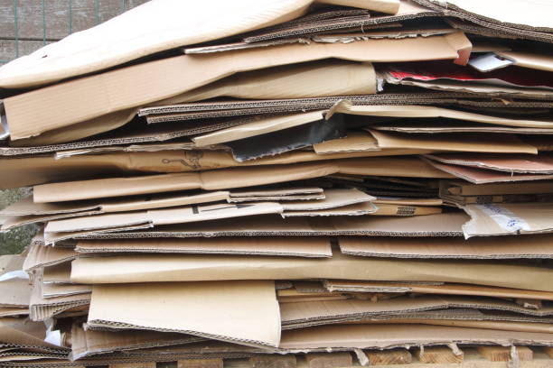 istock used cardboard boxes stacked for recycling, ecology concept 1317864347