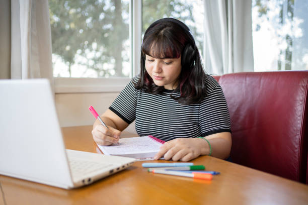 istock Young woman studying at homeschooling and distance learning. 1317865418