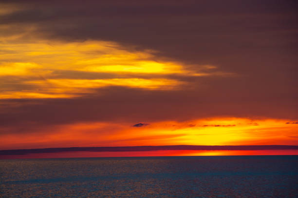 istock Beautiful dusk sea and orange sky 1317872644