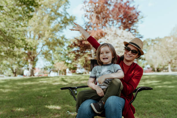 istock Mother at Musical Event in the Park 1317872744