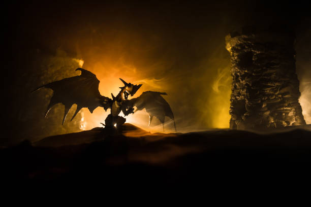 istock Battle between dragon and heroic soldiers. Creative table decoration. Selective focus 1317882826