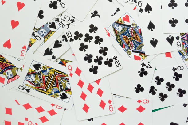 istock Playing cards on green background. 1317886354