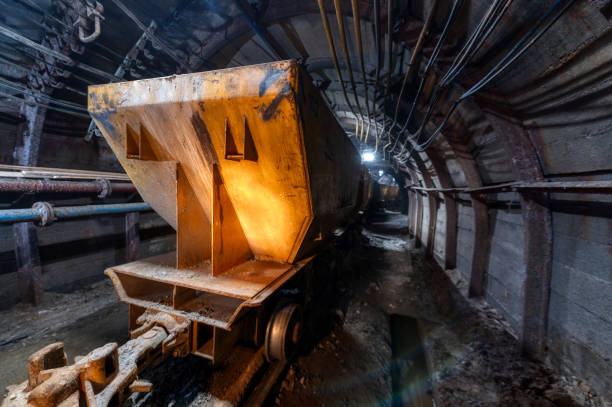 istock Underground mine. Underground railway for transporting ore. Mine trolley as part of an underground freight train 1317901044