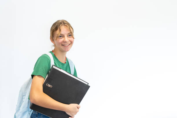 istock Teenage Schoolgirl With a Folder 1317902177