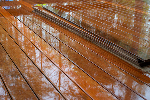 Ipe hardwood plank terrace on rainy day. Close up.