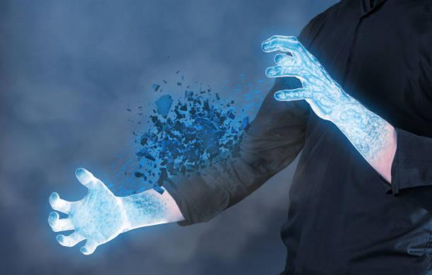 istock Frozen hands with cold stone shattering - Concept of power 1317903560