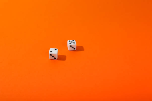 istock game dice on color background top view 1317904539
