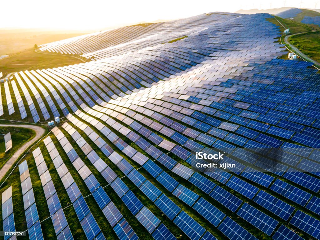 Aerial view of solar panels in mountain Solar Panel Stock Photo
