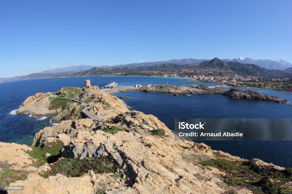 The town of Isula Rossa in Corsica View of the town of Isula Rossa and its surroundings in Corsica (Mediterranean Sea). L'Île-Rousse Stock Photo