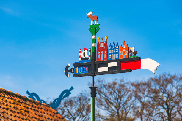 beautiful colorful weathercock waving in the curonian spit in nida - klaipeda imagens e fotografias de stock