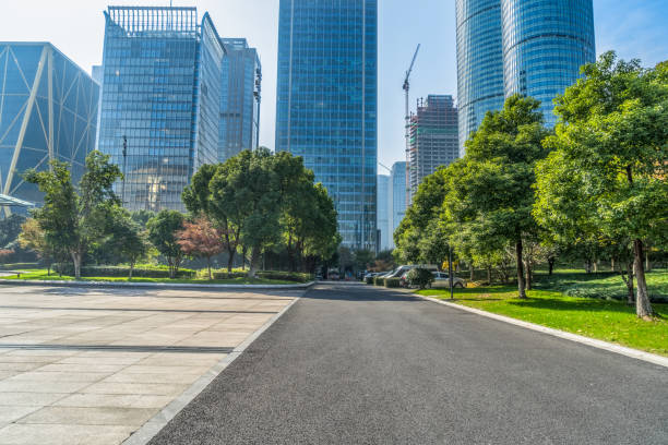istock empty urban road with modern building in the city 1317915872