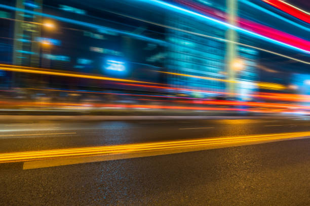 istock Vehicle light trails in city at night 1317915906