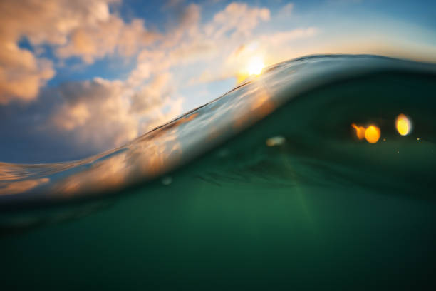 istock Sea wave close up, low angle view, sunrsie shot. 1317917178