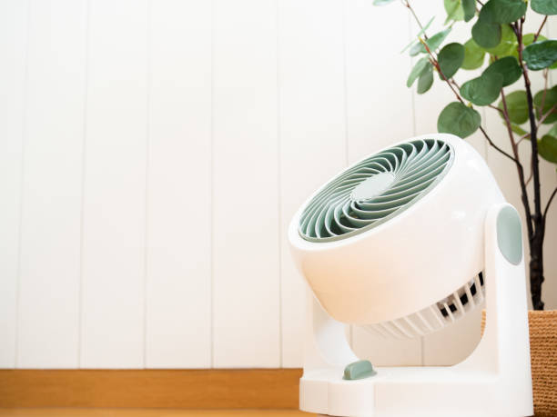 istock Air circulator fan on floor 1317920277