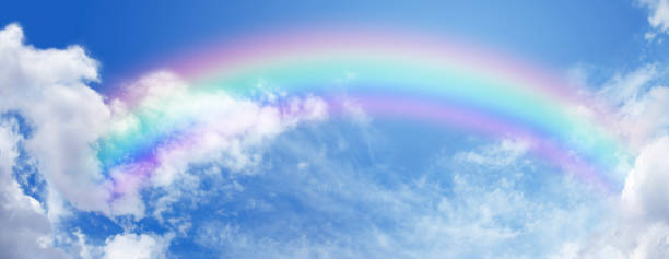 istock Beautiful sunny summer blue sky panoramic rainbow 1317921718