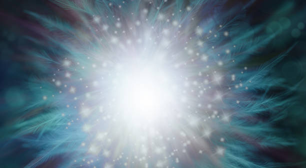istock Shimmering sparkling spiritual feather background 1317921848