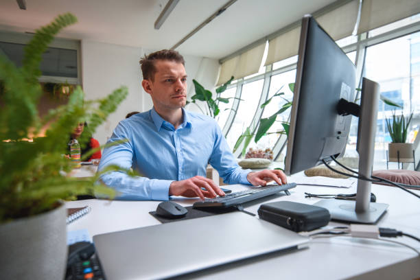 istock Caucasian Male in 30's Working In A Corporate Office 1317922765