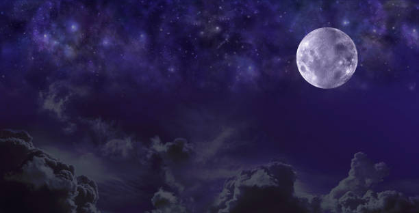 istock Moon stars and dark sky night banner 1317926490