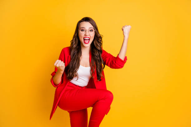 Portrait of her she nice attractive cheerful ecstatic overjoyed wavy-haired classy lady agent broker rejoicing breakthrough isolated over bright vivid shine vibrant yellow color background