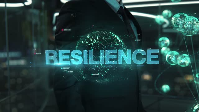 Businessman with Resilience hologram concept
