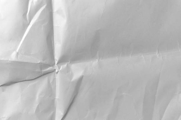 istock Abstract paper wrinkled dusty folded background 1317941052
