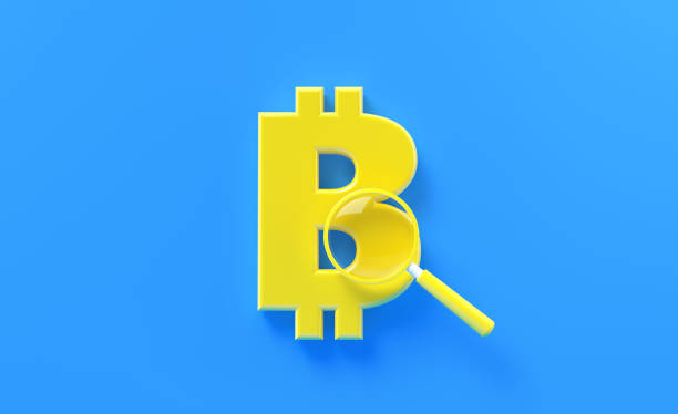 istock Yellow Magnifier Sitting Over Yellow Bitcoin Symbol On Blue Background 1317943392