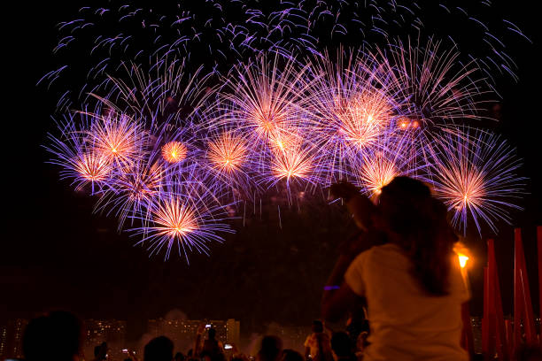 istock Beautiful colorful fireworks in the evening sky. 1317949537