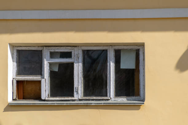 istock A horizontal narrow window with dirty glass 1317952612
