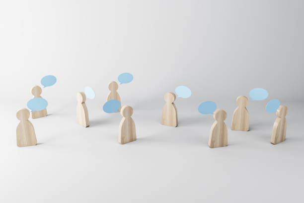 istock Multiple wooden figures with speech clouds on a light background. Social network and communication concept, 3d rendering 1317955286