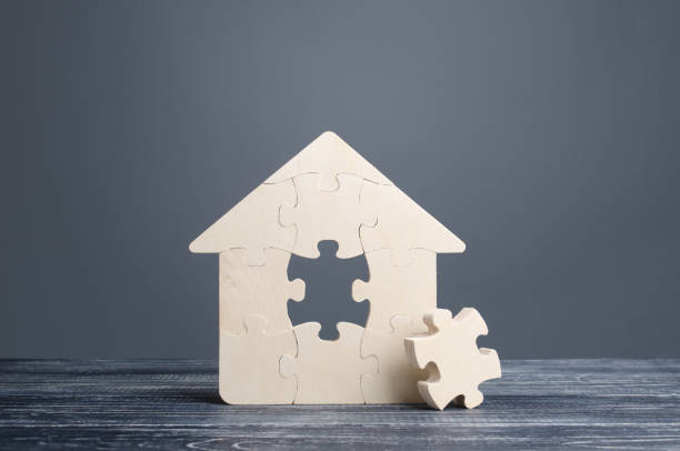 Puzzle house with a missing piece. The acquisition or construction comfortable dream home. Mortgage loan purchase real estate. Arrangement premises repair. Availability and cheapness. Finish building
