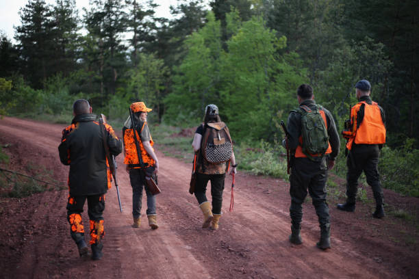 istock Hunters in the forest stock photo 1317961476