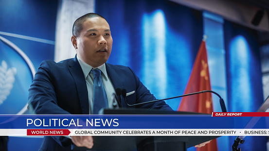 World Political News. Shot of Chinese Organization Representative Speaking at Press Conference. Minister Delivering a Speech at Congress. United States of America and People's Republic of China Flags.