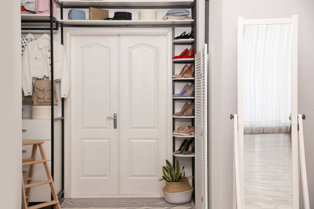 istock Closet interior with storage rack for shoes, clothes and accessories 1317963450