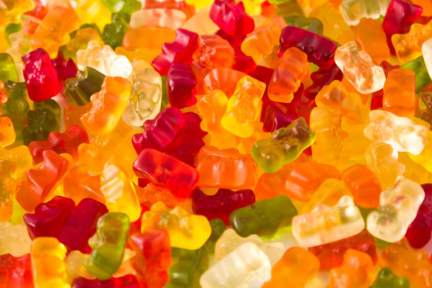 Full frame multicoloured gummy bears Full frame assortment of multicoloured gummy bears gum drop photos stock pictures, royalty-free photos & images