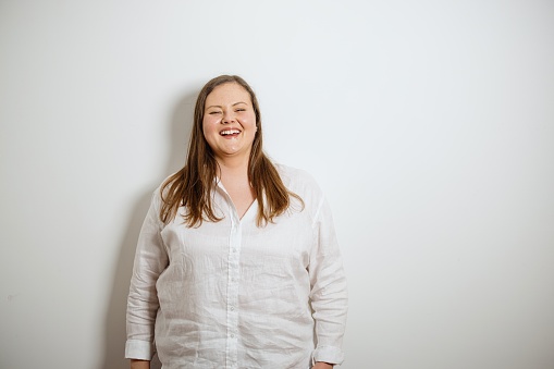 Portrait of a confident plus size woman. Oversized woman posing and looking at camera on white background. Body Confidence, Body Positivity And Self Esteem