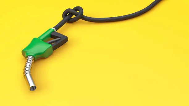 Fuel pump with hose Knot. Fuel sales limitation concept. Yellow background. Copy space for text. 3d render.