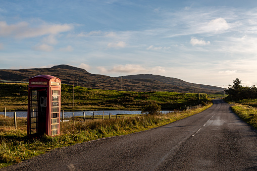 Group of iconic red telephone booths.