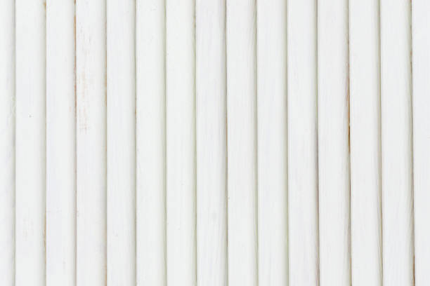 istock White stripes texture. Stripped wooden background. Bright window shutters closeup. 1317970935